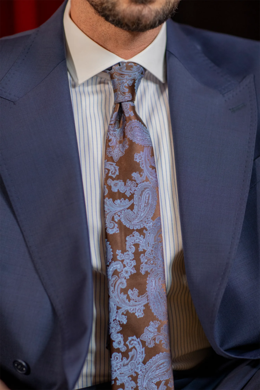 Brown and light blue silk tie with paisley pattern